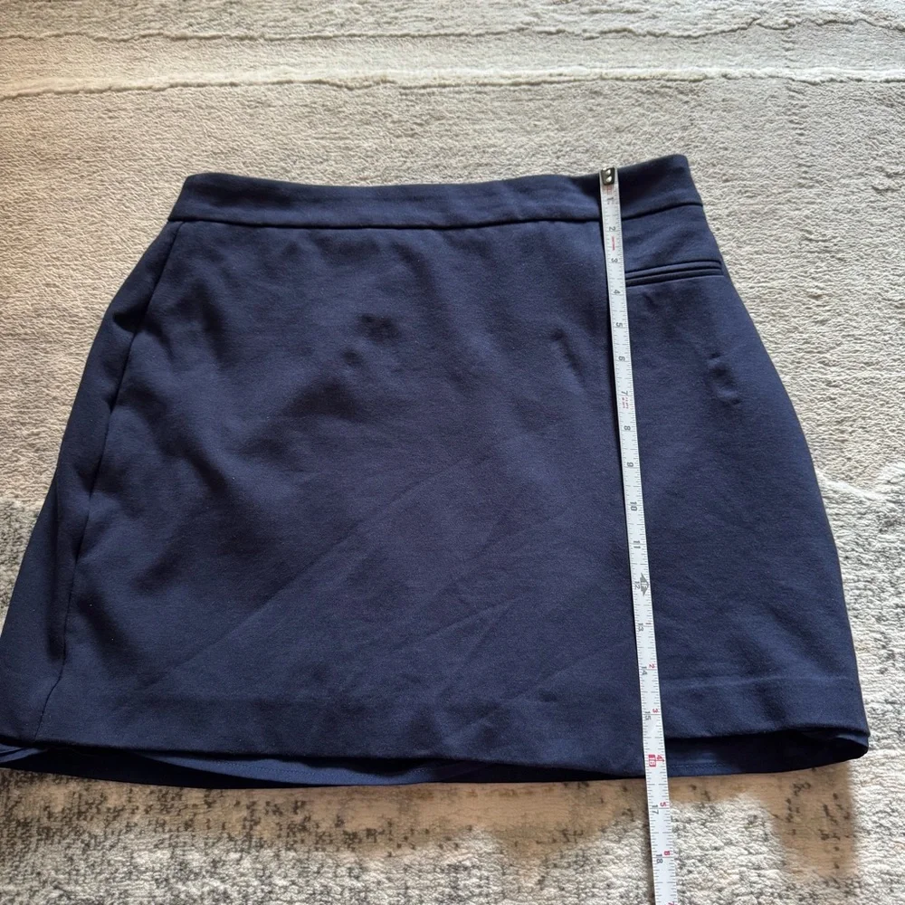 Ann Taylor Loft rich navy faux wrap asymmetrical skirt with faux pocket accent
